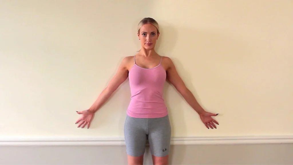 Wall Press (Somatic Strengthener) in somatic Pilates session