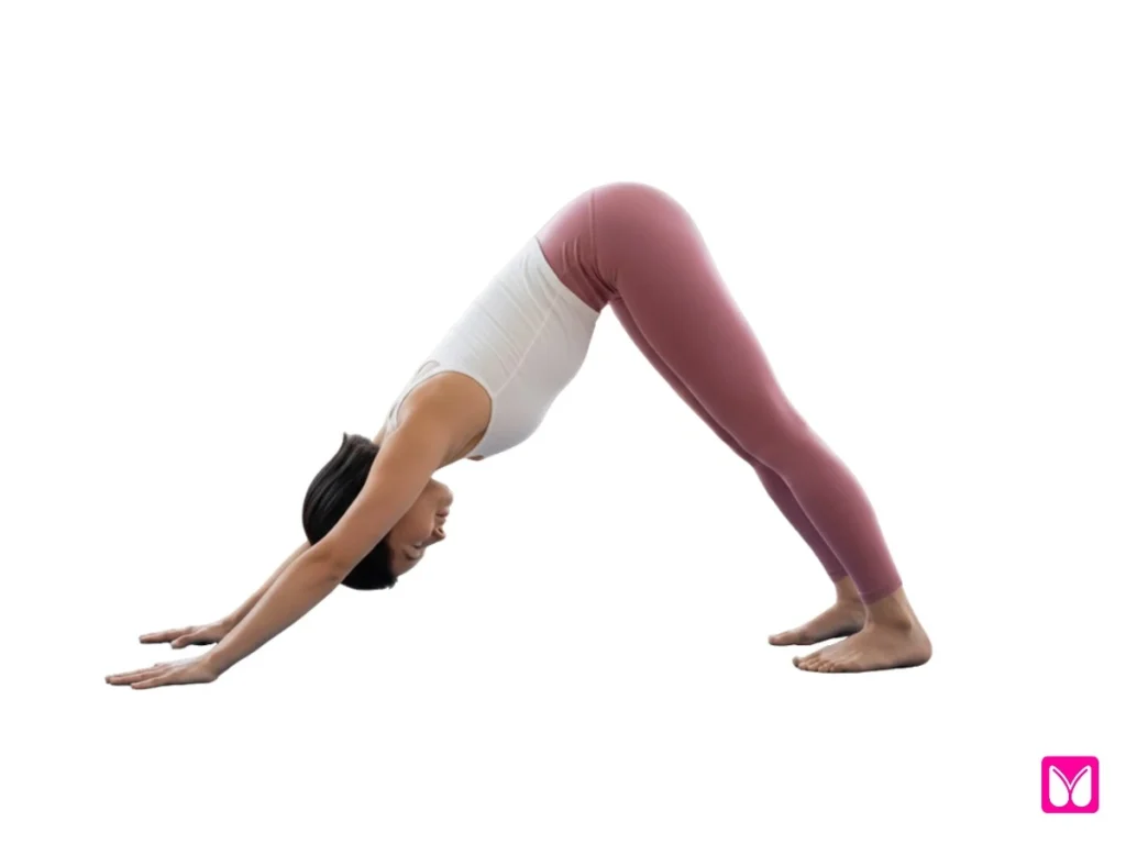 A woman in Downward-Facing Dog (Adho Mukha Svanasana), a foundational pose in yoga for beginners that stretches the hamstrings and strengthens the shoulders.