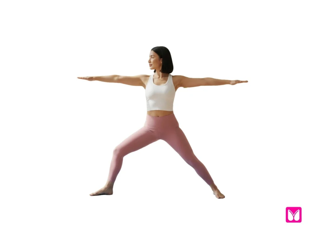 A practitioner in Warrior II pose, demonstrating a standing posture used in yoga for beginners to build stamina and focus.